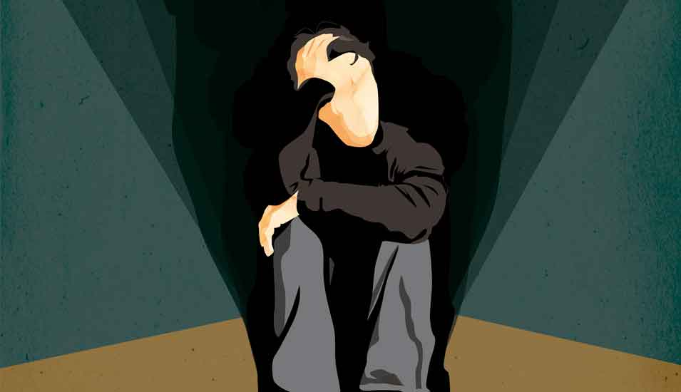 Illustration einer Person, die sich in einer dunklen Ecke zusammenkauert und sich sorgenvoll den Kopf hält