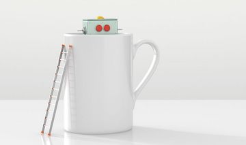 Roboter versteckt sich in einer weißen Tasse