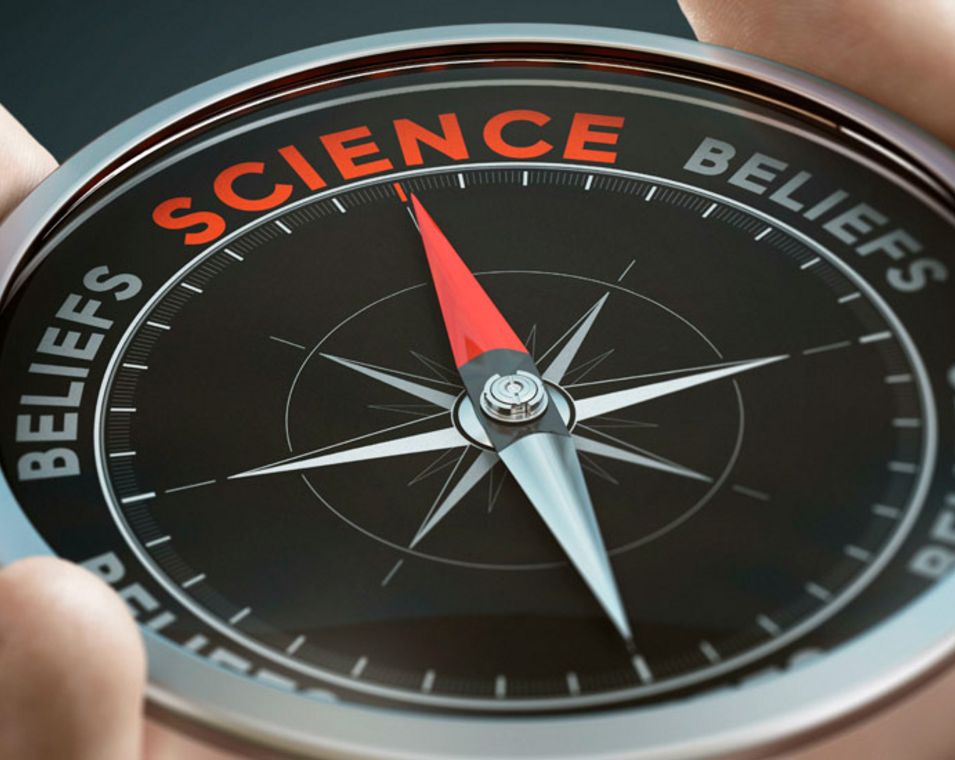 Ein Kompass zeigt "Science" (auf Deutsch Wissenschaft) an statt der sonstigen Richtungen "Beliefs (auf Deutsch Glauben). "