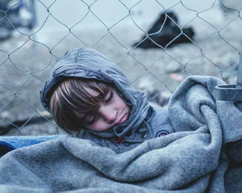 schlafender Junge im Flüchtlingscamp in Idomeni
