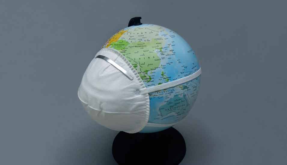 Globus mit Atemschutzmaske