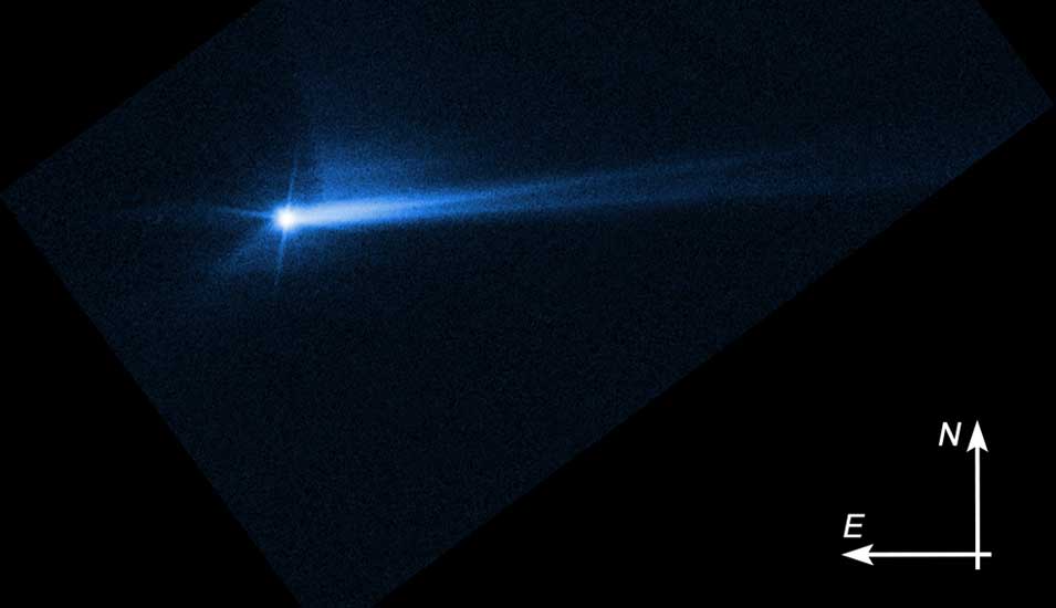Dieses Bild, aufgenommen vom Hubble-Weltraumteleskop der Nasa am 8. Oktober 2022, zeigt die Trümmer der Nasa-Raumsonde "Dart" nach dem absichtlichen Aufprall auf dem Asteroiden Dimorphos am 26. September.