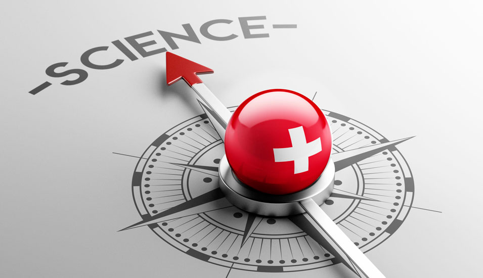 Schweizer Ausrichtung auf Forschung: Ein Ball mit dem Schweizer Kreuz liegt auf einem Kompass, der auf das Wort "Science" zeigt.