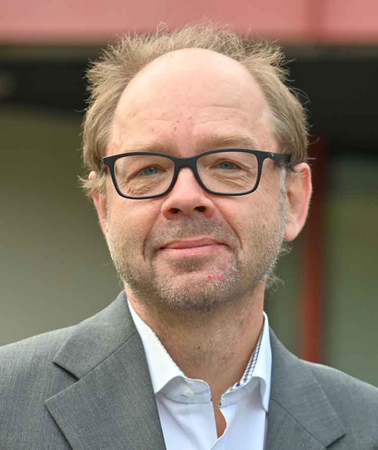 Portraitfoto von Dr. Christian Hülshörster